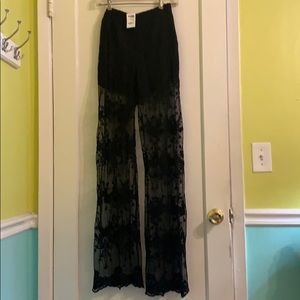 Black lace pants with shorts underneath